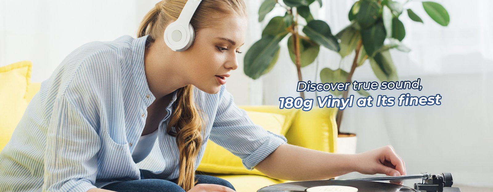 Woman wearing white headphones adjusting a vinyl record on a turntable, with overlay text Discover true sound, 180g Vinyl at Its finest promoting premium vinyl listening experience.